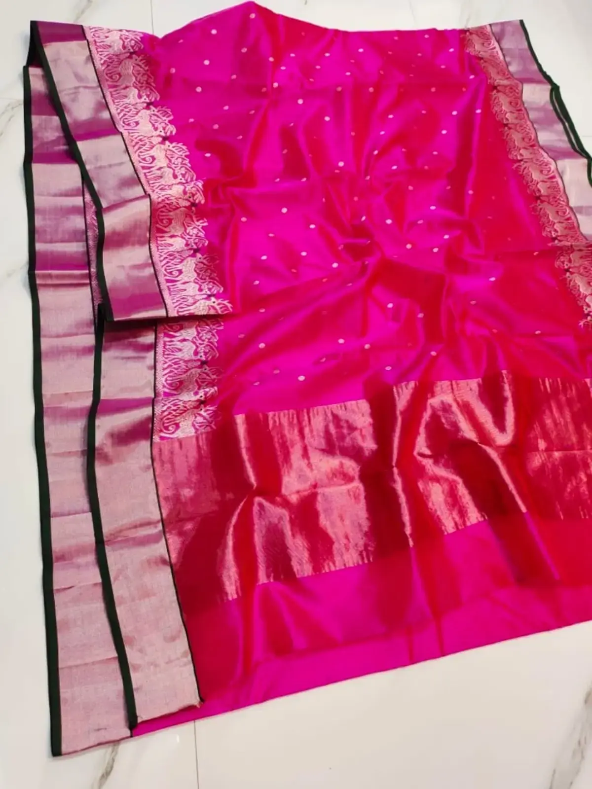 Cerise Splendour with Scintillating Silver Elephant Motif Pattu Silk