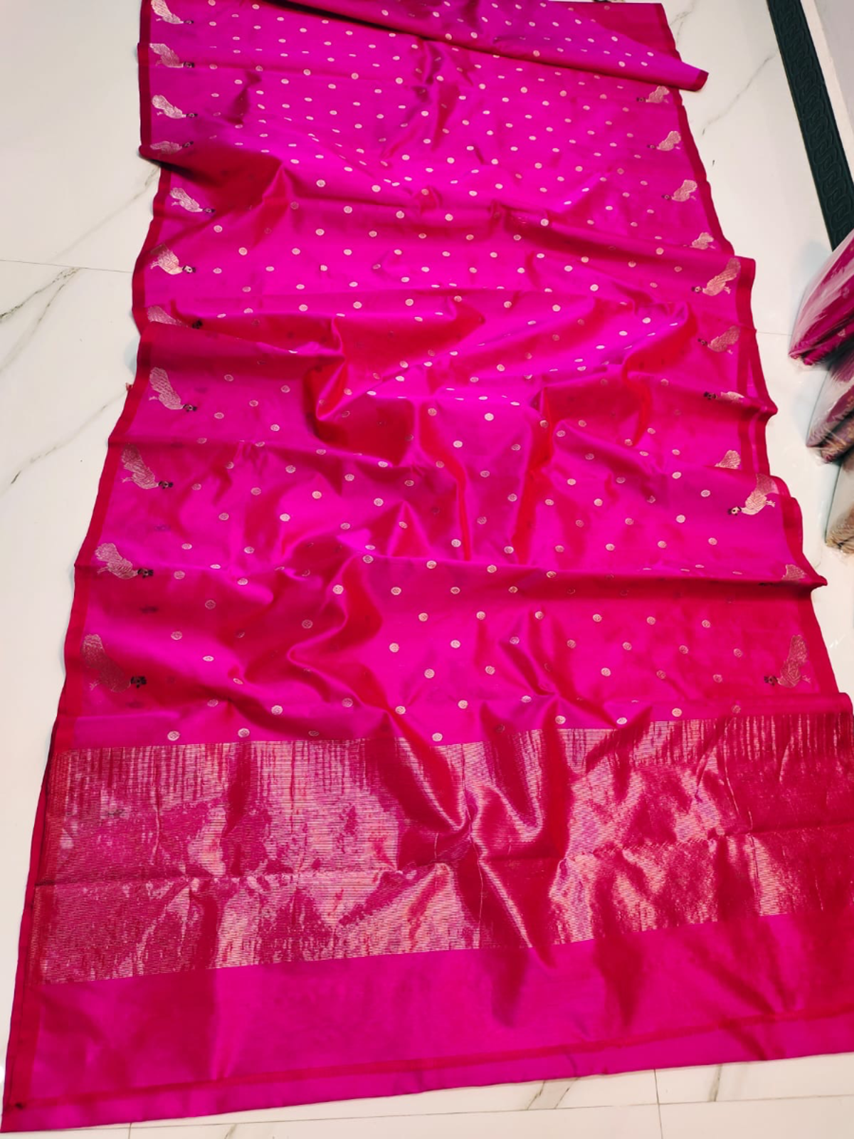 Fuchsia Radiance with Silver Buttah and Peacock Motifs Pattu Silk