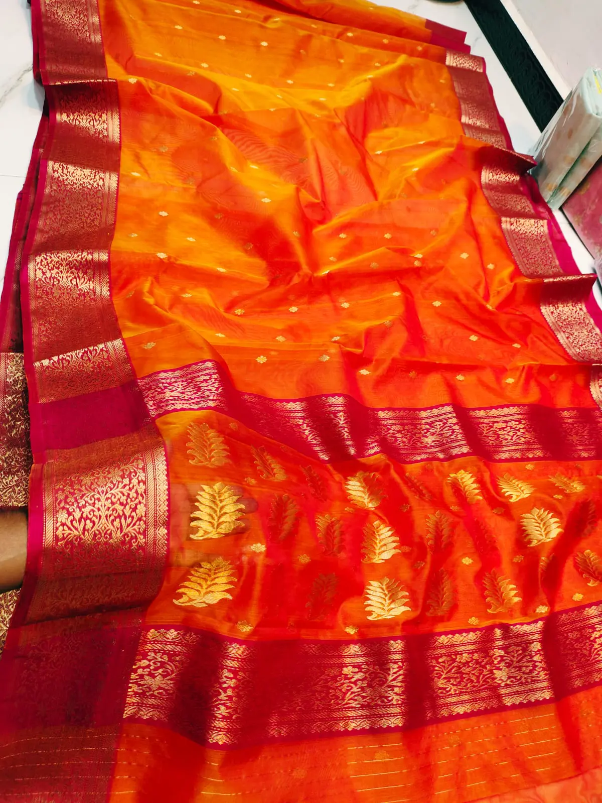 Handwoven Saffron Sunset & Crimson Saffron Sunset with Intricate Leaf Motifs and Crimson Zari Border Kataan Silk - Authentic Chanderi Silk Saree Chanderi Saree - View 1